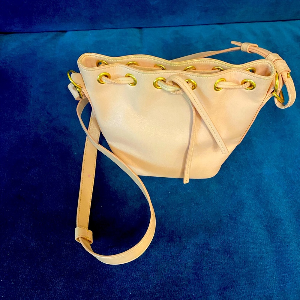 YSL light pink bucket crossbody bag